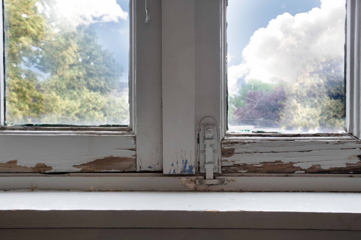 Woodworm Treatment Specialists - Window with Signs of Woodworm